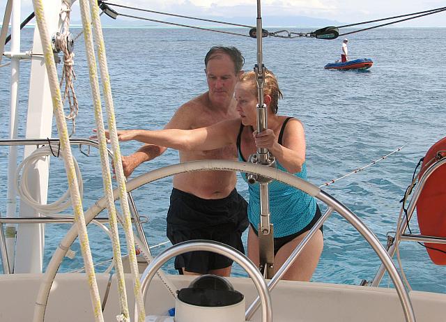 Sharon & John get back aboard. Martine stands by with the dinghy