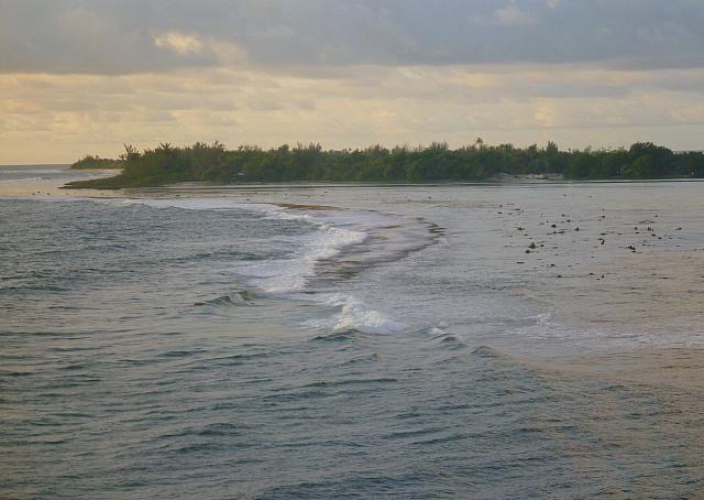 Passing through natural opening in coral reef to anchor in Maroe Bay.