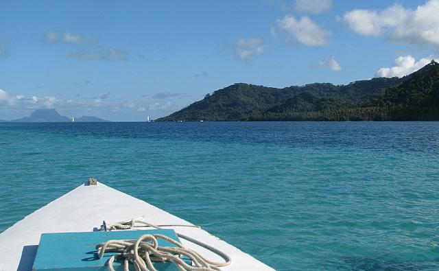 Note the water shades - turquoise where it is shallow and darker blue where it is deeper.  That's Bora Bora in the distance.