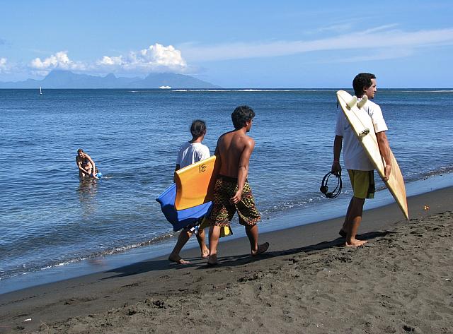 Surfers at Point Venus