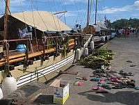 Flip flops are from the local children who were visiting the vaka